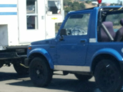 Samurai towed behind the camper, nice little set up.